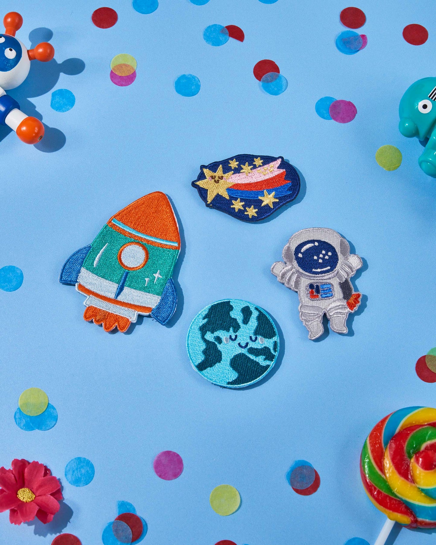 Patchel Space Explorers patch pack displayed on a colourful background with space-themed patches